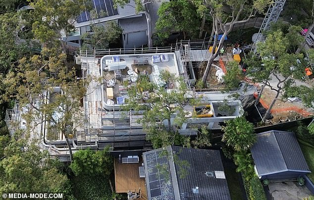 His plans to demolish a 1960s cottage and replace it with a large six-story mansion for his family were first met with opposition from neighbors who objected to the removal of seventeen native trees.