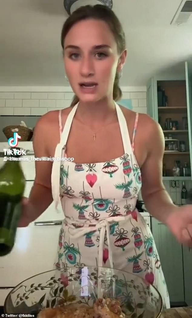 Gaddis is seen wearing an apron and cooking in her kitchen after a rant in which she used the n-word appeared on Twitter and TikTok