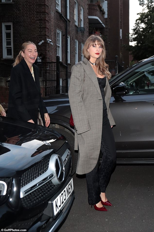 Taylor arrived at the chic London restaurant with her longtime boyfriend Este Haim