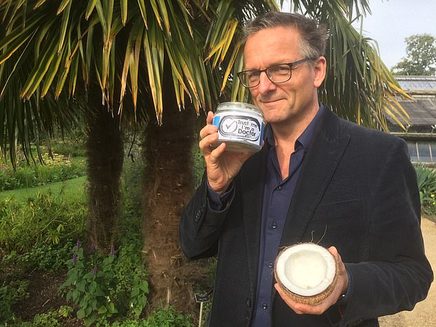 Mr Mosley pictured on Trust Me, I'm A Doctor - a BBC health program - holding a jar of coconut oil and a coconut