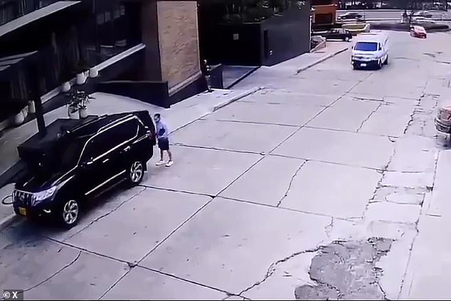 We see a businessman specializing in real estate standing next to his SUV (bottom right), as the ambulance (top right) used by the kidnappers approaches him