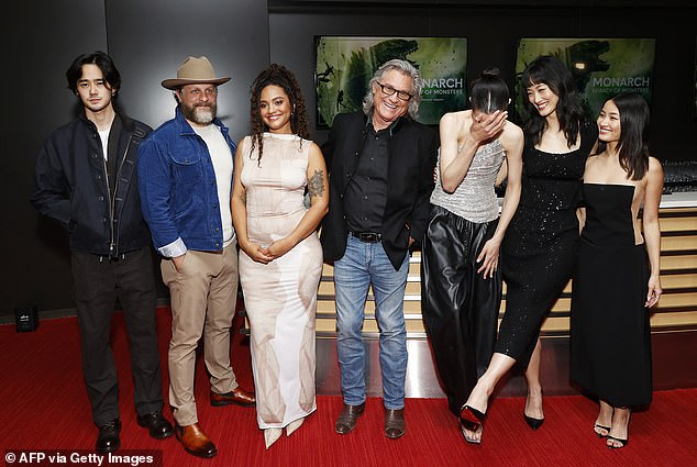 Russell, pictured with his co-stars at Saturday's event, plays the older version of former US Army Colonel Lee Shaw in the hit Apple TV+ series