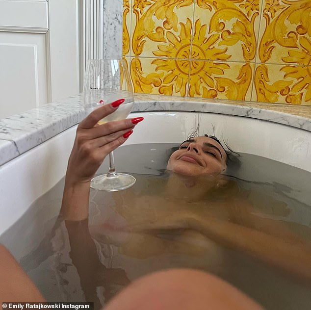 The podcaster recently celebrated her birthday and shared a slew of photos from the trip, including a photo of herself drinking wine in the bath