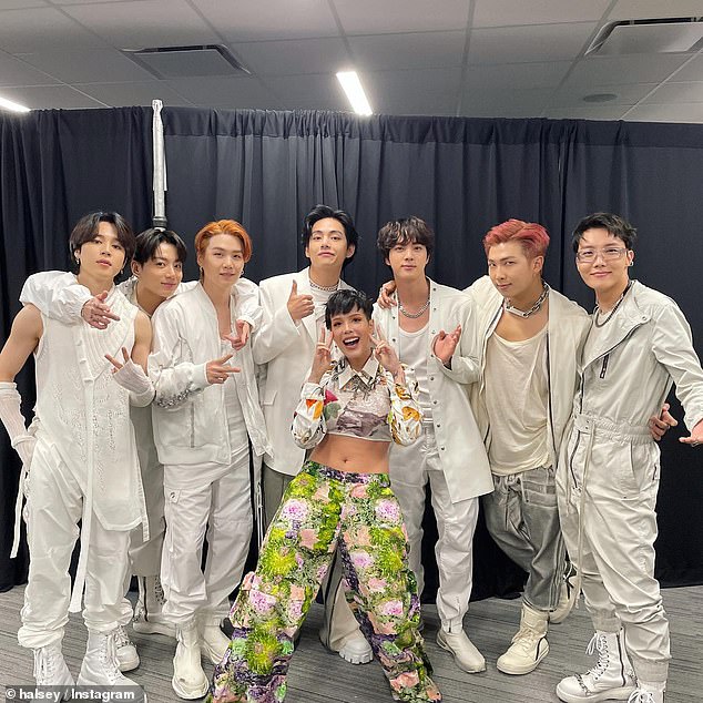 Fellow artist Halsey is pictured with the hugely popular boy band after attending one of their concerts in December 2021