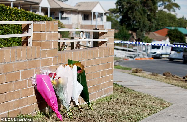 Floral tributes are pictured at the site of the June 1 explosion in Western Sydney