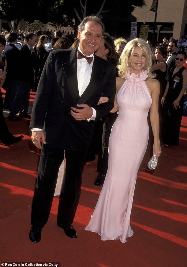 Heather is pictured with her proud father at the 47th Annual Primetime Emmy Awards in 1995