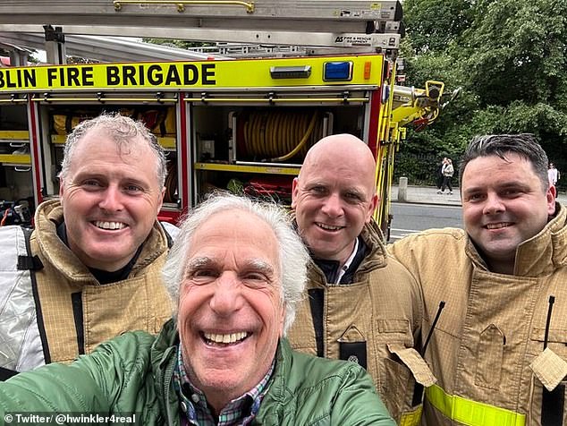 After the incident he posted a selfie with some firefighters on X and wrote: 'Thank you Dublin Fire Brigade... our hotel was evacuated on our first morning'