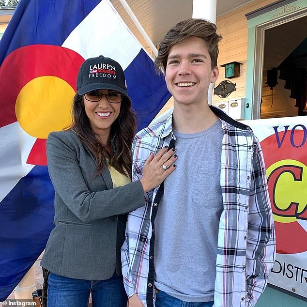 Boebert is pictured with her son, 17-year-old Tyler, who is now expecting a baby with his girlfriend