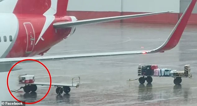 Ms Becke claims her luggage was left on a trailer which was towed to the Sydney Airport tarmac while it rained heavily (pictured)