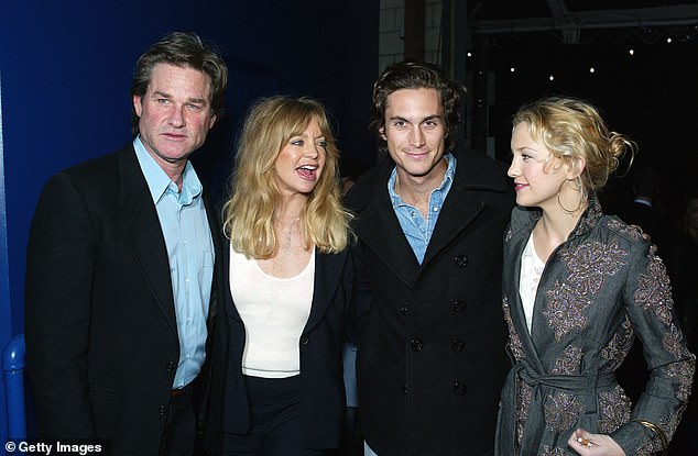 Hawn shares Kate, 45, and Oliver, 47, with ex-husband Bill Hudson, and is mother to son Wyatt Russell, 37, with partner Kurt Russell;  Kurt, Goldie, Oliver and Kate seen in 2003