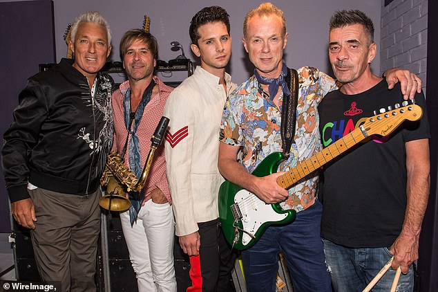 Wild (third from left), who replaced Tony Hadley as lead singer of the '80s band in 2018 before being fired 11 months later, was arrested by officers at his home on March 30, 2021.