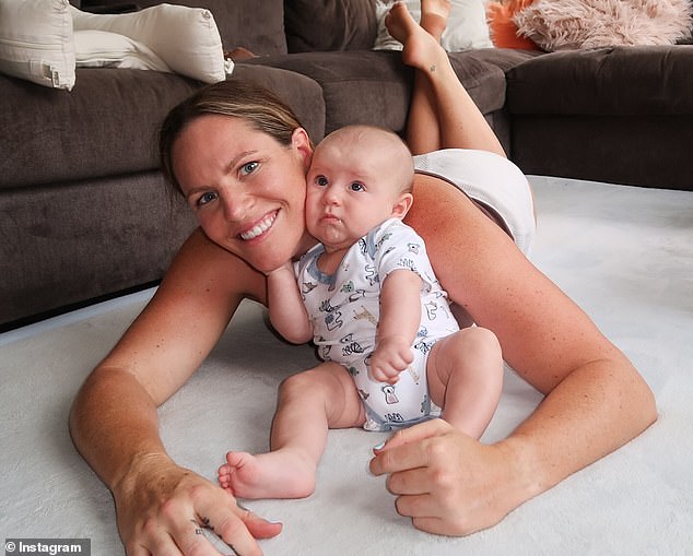 Aussie swimming champion Emily Seebohm with son Sampson