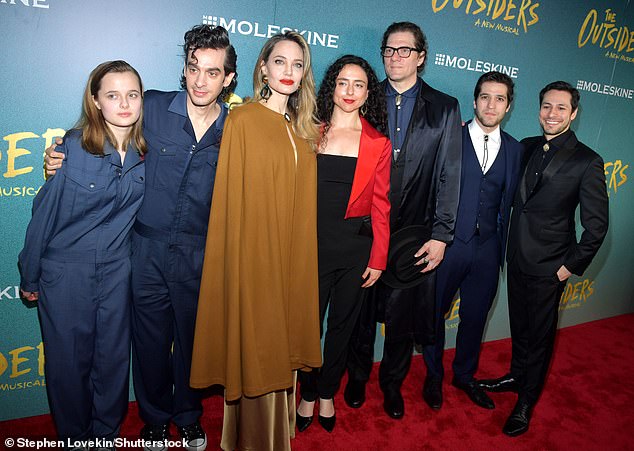 Daughter Vivienne (L) listed her name as 'Vivienne Jolie' in a poster for the musical adaptation of The Outsiders, which her mother produced while working as her assistant;  seen on April 11 in NYC