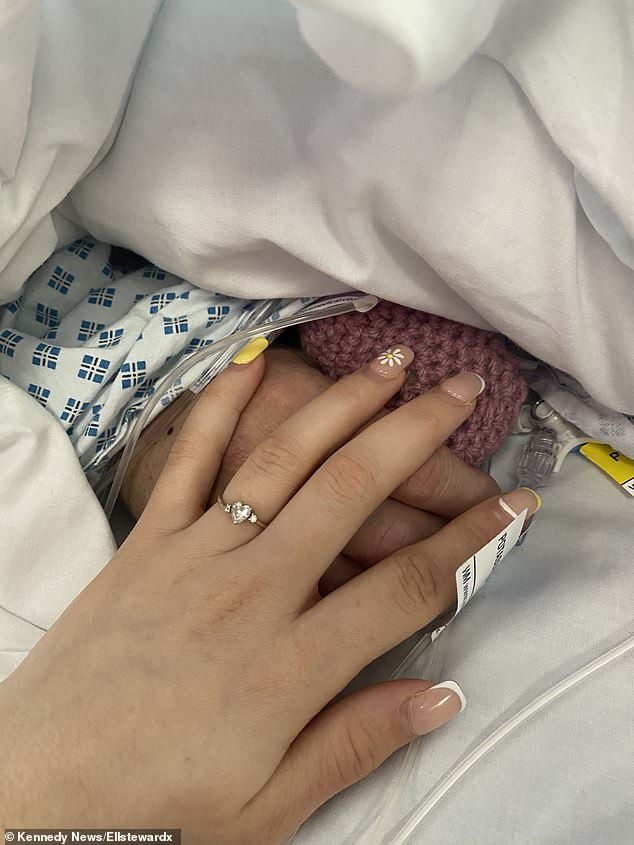 Ellie held her mother's hands after falling into a coma following her heart attack