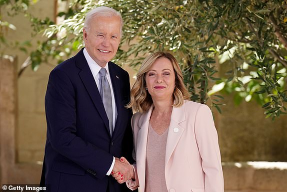 FASANO, ITALY - JUNE 13: US President Joe Biden and Italian Prime Minister Giorgia Meloni pose for photos during a welcome ceremony on the first day of the 50th G7 Summit at Borgo Egnazia on June 13, 2024 in Fasano, Italy.  The G7 summit in Puglia, hosted by Italian Prime Minister Giorgia Meloni, and the seventh in Italy, will bring together leaders from the seven member states, the EU Council and the European Commission.  The discussions will focus on topics including Africa, climate change, development, the Middle East, Ukraine, migration, economic security in the Indo-Pacific region and artificial intelligence.  (Photo by Christopher Furlong/Getty Images)