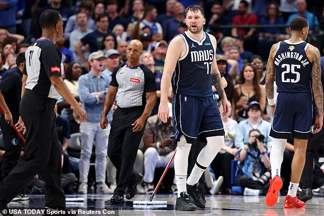 Doncic talks to a referee after a game against the Boston Celtics in the fourth quarter