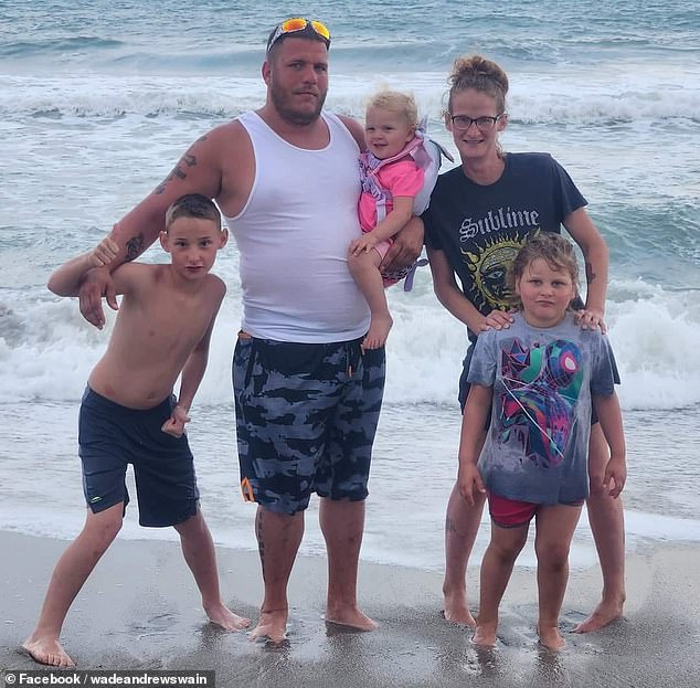 His family said Hunter's mother Diana Ebie (pictured with Hunter on the left, his stepfather Sam Chambers and Hunter's sisters) watched in horror and dove in to save him.