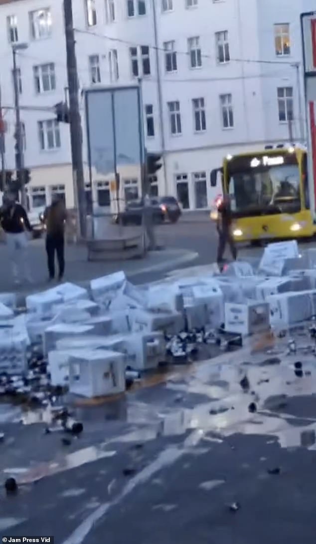 The street was completed, covered in beer, boxes and broken glass