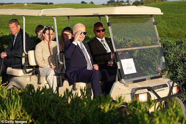 US President Joe Biden joins G7 leaders as they gather to watch a skydive at San Domenico Golf Club during the first day of the 50th G7 Summit on June 13, 2024