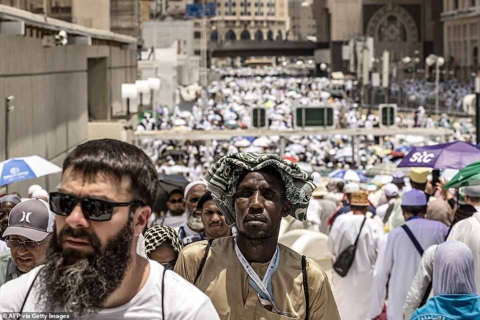 Muslim pilgrims are seen arriving in Saudi Arabia's holy city of Mecca on Tuesday