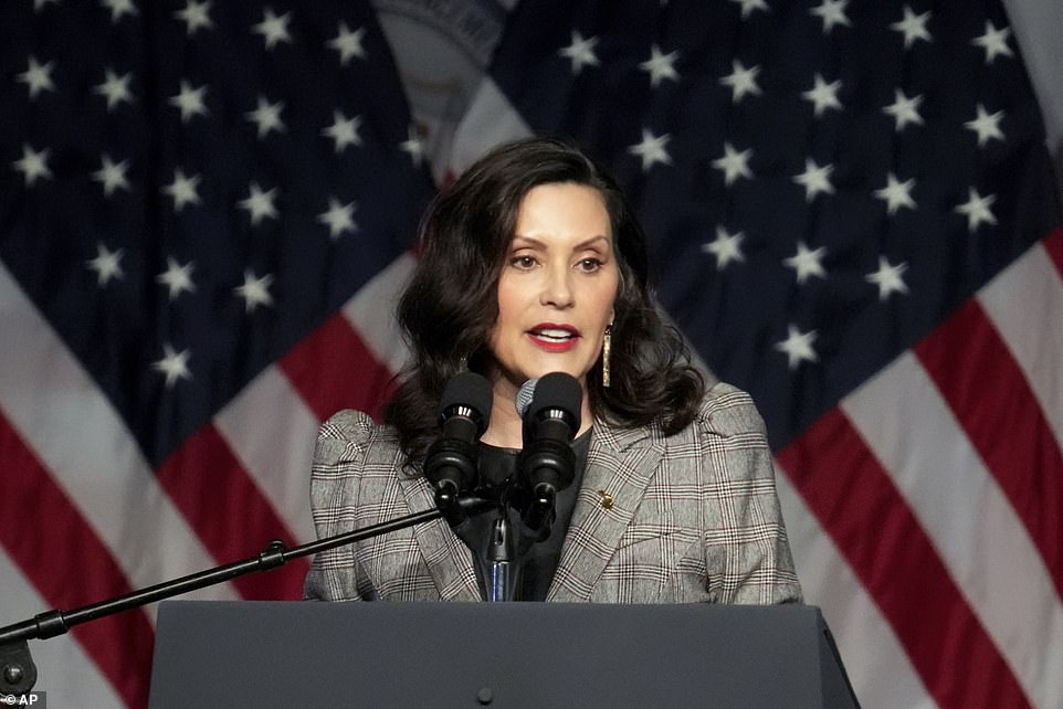 “I'm sorry,” Whitmer interjected as he touched the earpiece and it appeared she or an off-camera assistant said, “Oh, (expletive).”  