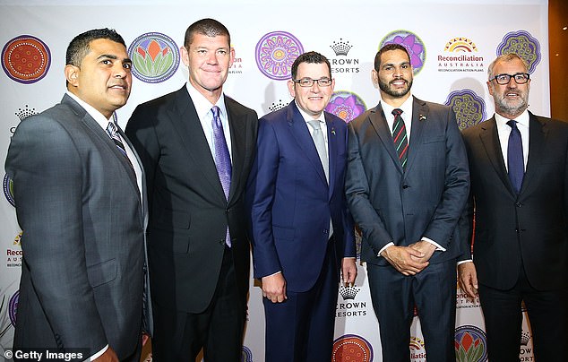 Pictured: Mr Mohamed (left) alongside James Packer, former Victorian Premier Daniel Andrews and former NRL player Greg Inglis