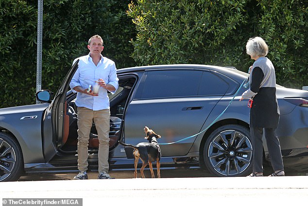 He was seen getting out of his car and meeting his mother on her dog walk.