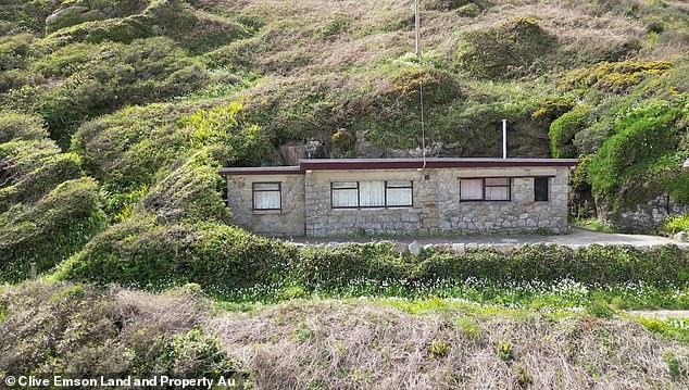 The beautiful one bedroom bungalow is nestled in the cliffs near the famous Minack Theater and overlooks Porthcurno beach in Cornwall