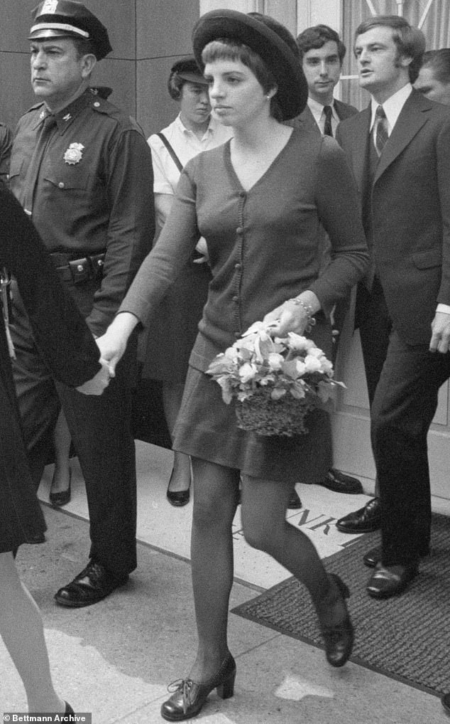 Minnelli is pictured emerging from her mother's memorial service at the Frank E. Campbell Funeral Home in New York City in 1969
