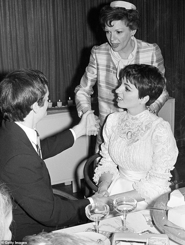 Garland is pictured with Minnelli and her first husband Peter Allen at their wedding in 1967;  Minnelli would eventually divorce four times