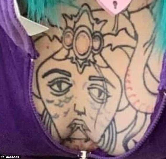 This photo, originally shared on Facebook, appears to show a questionable face on a woman's chest