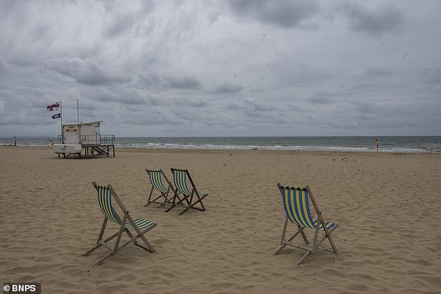 In terms of specific dates, June 22nd looks set to be the first day of real heat, with highs of 25°C in London.  Pictured: Bournemouth beach on June 13