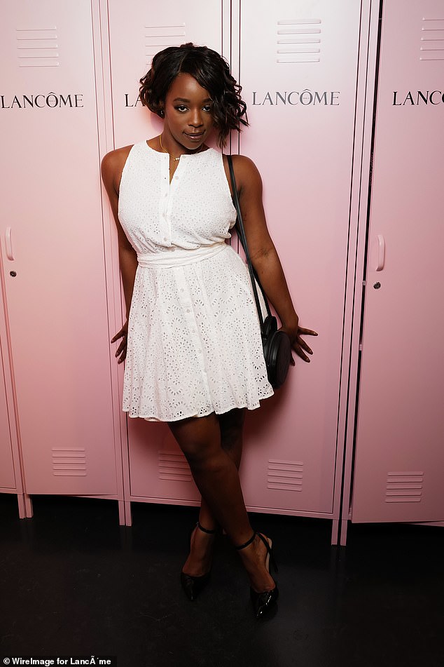Corrina Brown wowed in a white summer mini dress and black heels