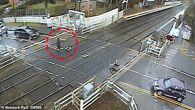 Heartbreaking footage shows man ignoring flashing red lights and crashing through barriers at Blakedown station in Worcestershire