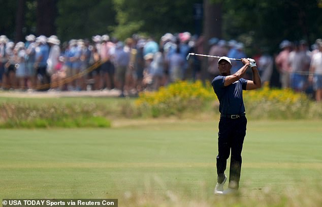 Woods deflected nine shots off leaders Rory McIlroy and Patrick Cantlay