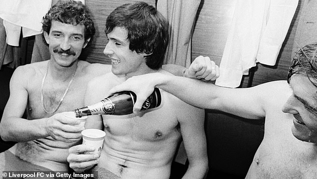 Hansen (center) is a rare breed and no one has a bad word to say about him.  Here he is pictured after winning the title with Liverpool in 1983