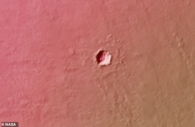 Scientists aren't sure how deep the holes are on Mars (photo).  They think they formed after a volcanic explosion caused lava tubes to form