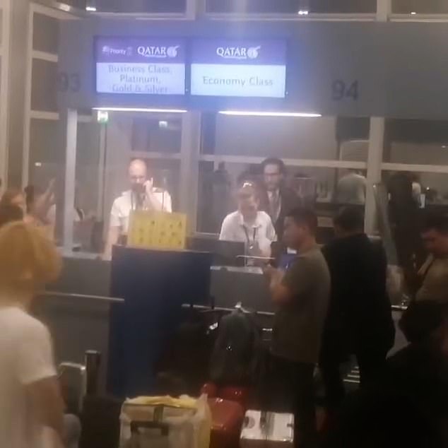 Despite the rush of waiting passengers, there were only two employees working behind the check-in desk