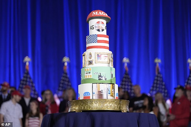 Club 47 organizers brought out a six-tier cake featuring scenes from the Oval Office and on the golf course, as well as a bright red MAGA hat