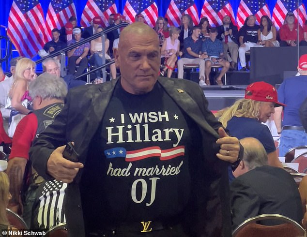 A supporter who attended former President Donald Trump's birthday event in Florida on Friday evening wore a shirt that read: 'I wish Hillary had married OJ'