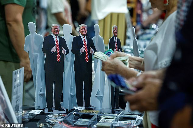 Cardboard cutouts of the birthday boy were sold at the back of the convention center before the ex-president's appearance