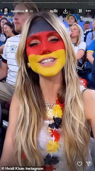 During the match, she shared more videos of herself and Kaulitz in the stands cheering and singing for Germany