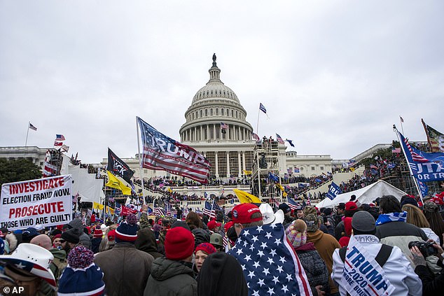 Rioters loyal to Donald Trump prepare to storm the US Capitol on January 6