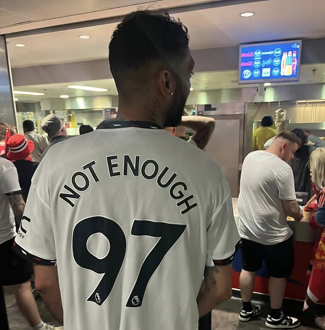 Manchester Utd fan James White was banned last year for wearing this shirt at Wembley
