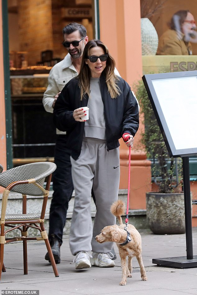 The duo appeared in good spirits as they laughed and chatted while sipping their coffee