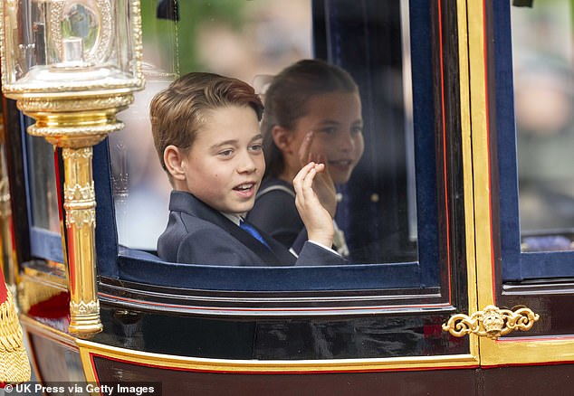 Prince George of Wales and Princess Charlotte of Wales wave during Trooping the Colour