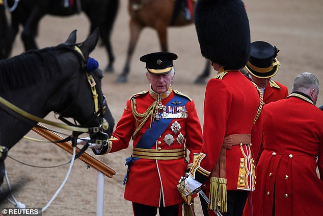 Britain's King Charles arrives for the Trooping the Color parade in honor of his official birthday