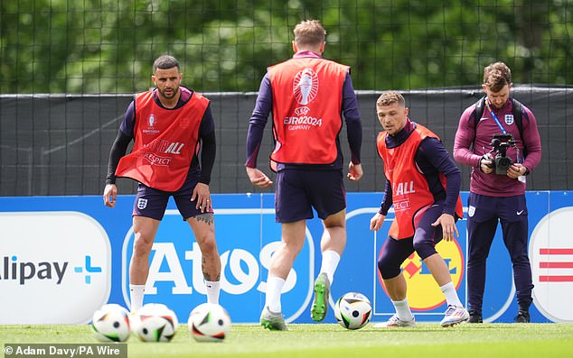 Kyle Walker (left) and Kieran Trippier (right) take part in defensive training exercises