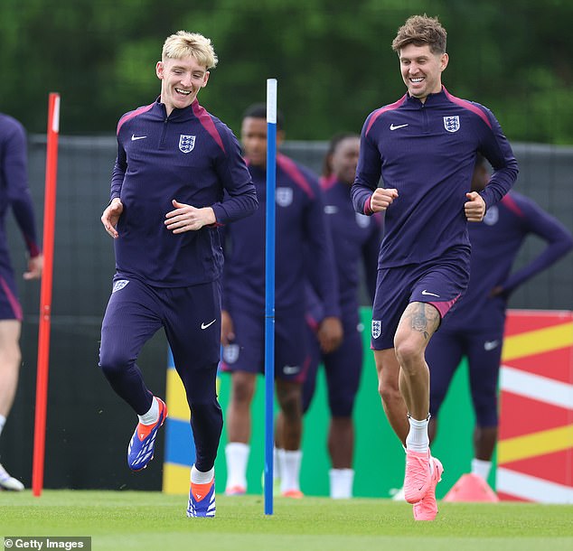 Newcastle winger Anthony Gordon (left) and Man City defender John Stones (right) were all smiles during training