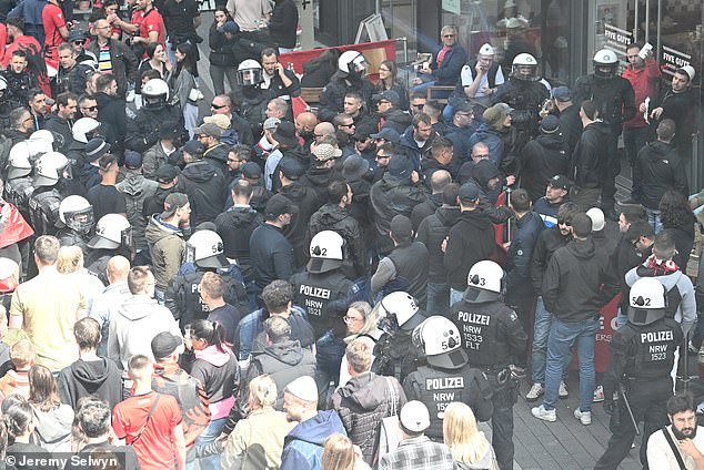 Police surround Albanian ultras after violence broke out for the first time today at Euro 2024 when more than 100 Albanians tried to attack Italian fans